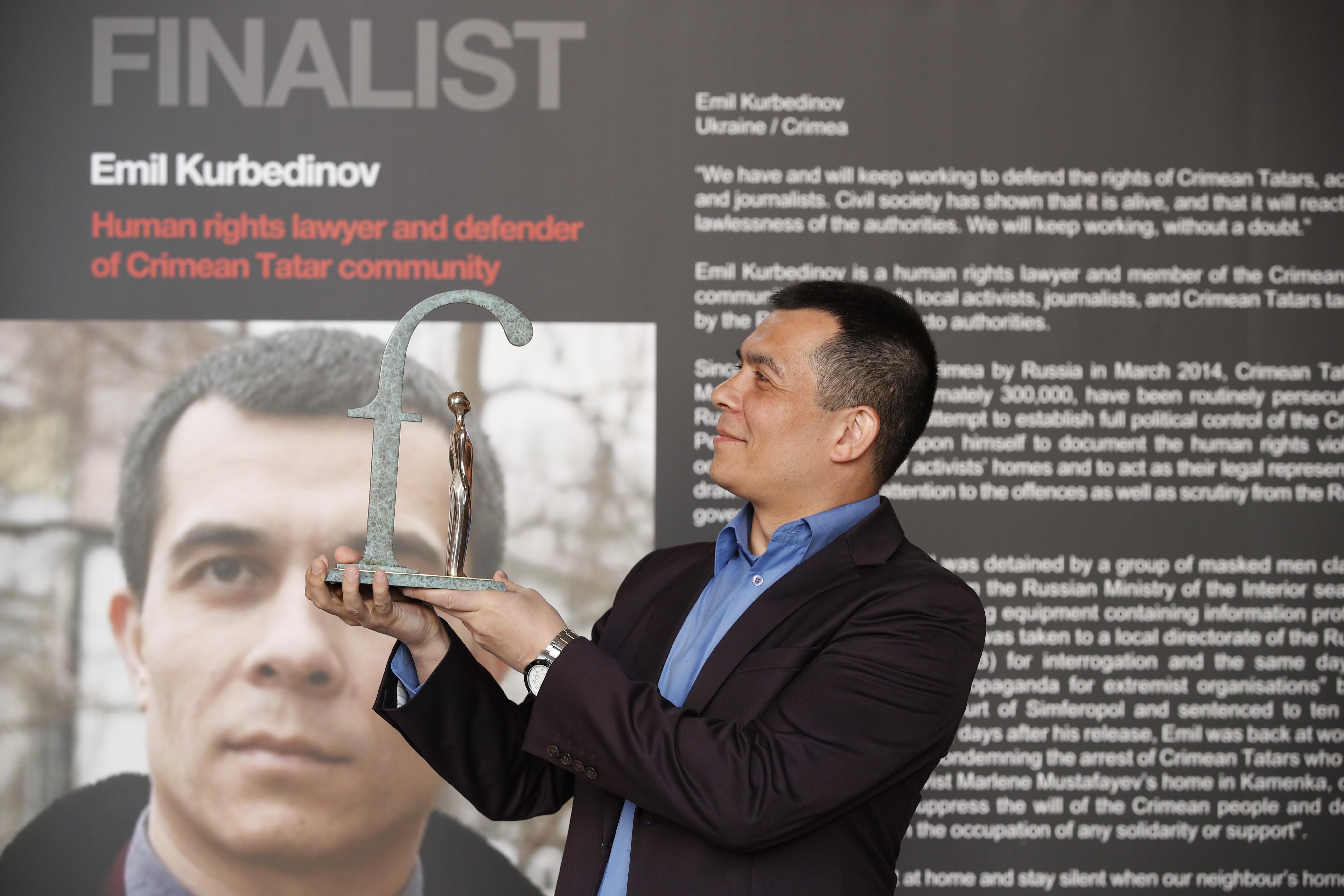 Emil Kurbedinov Receiving FLD Award